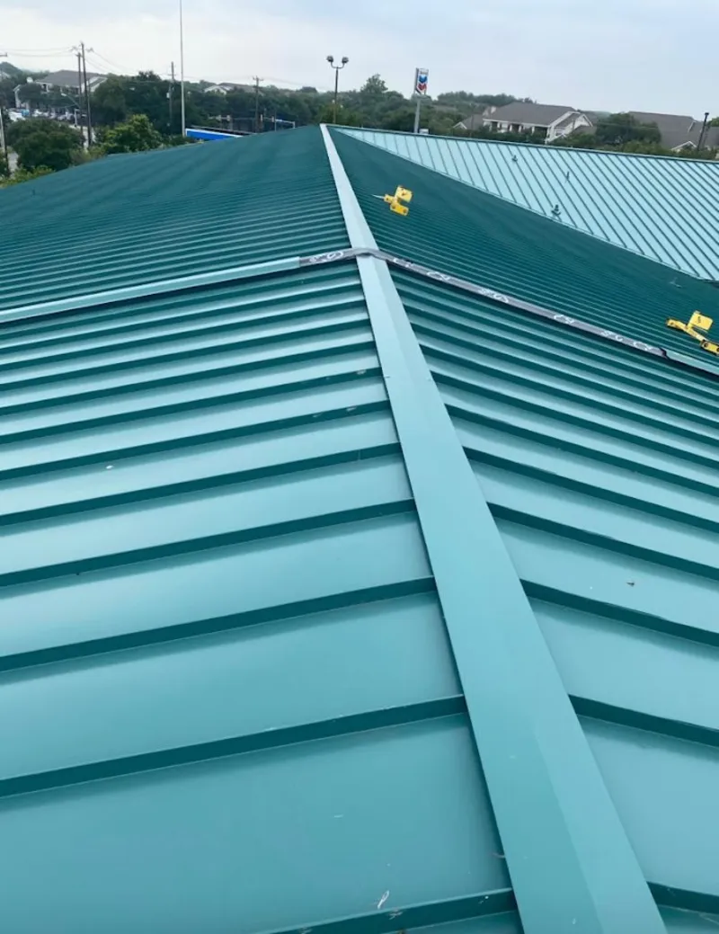 Green commercial metal roof ridge and valley for Metal Roof Repair in Frankfort Square