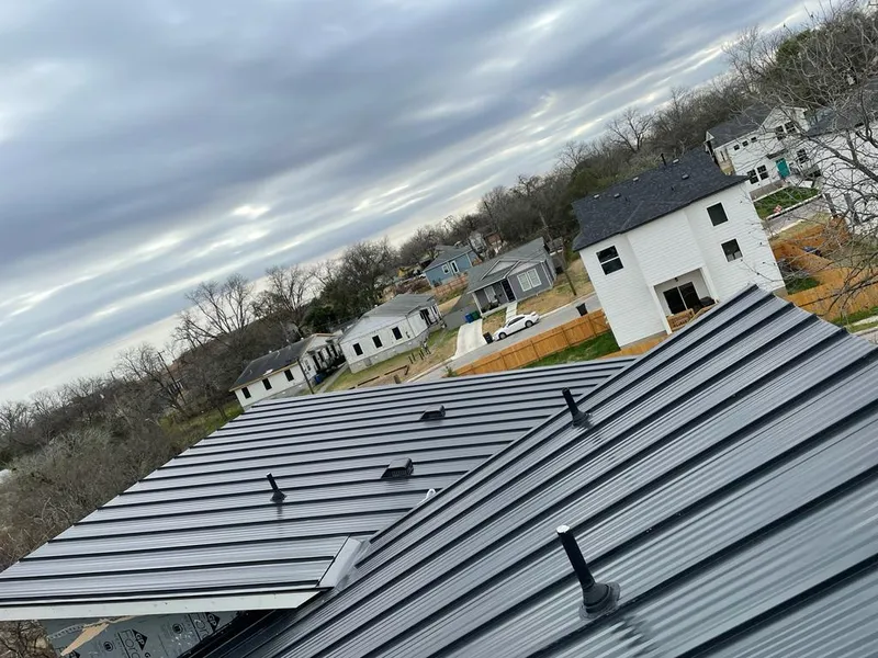 Standing seam metal roof panels with vents for Skylight Repair in Frankfort Square